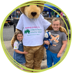 Buddy the mascot with a child